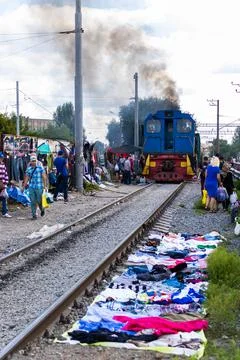 Train through a market Stock Photos
