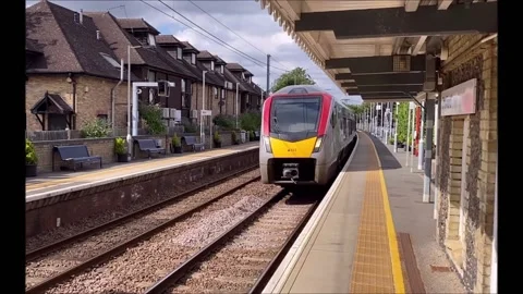 Train through Shelford station Stock Footage 164949843