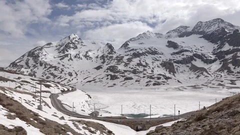 Train through snowy mountains Stock Footage 93583291