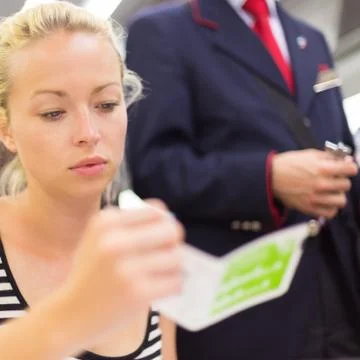 Train ticket check. Stock Photos