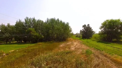 Train Track Crossing Pan Across Color Corrected Stock Footage 98959063