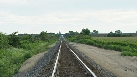 Train Track Going Through Farms In Rural Iowa or Illinois Midwest Video stock 108384868