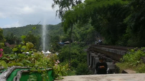 Train track on hellfire pass mountain at Tham krasae in Kanchanaburi, Thailand Stock Footage 156589044