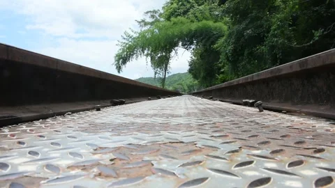 Train track on hellfire pass mountain at Tham krasae in Kanchanaburi, Thailand Stock Footage 156589058
