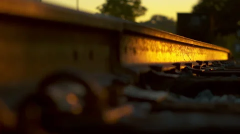 Train track rail in focus with boxcar out of focus Stock Footage 41818260