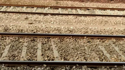 Train track shifting view with curves and open path ahead Stock Footage 333268429