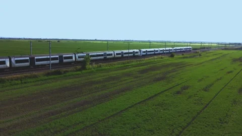 Train Tracking Drone Shot, Bright Sunlight, 4K Stock Footage 168950864