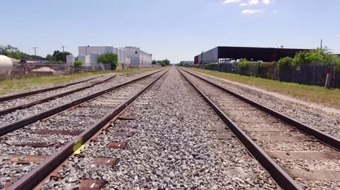 Train Tracks with blue skyline slow motion with track switch Stock Footage 63210987