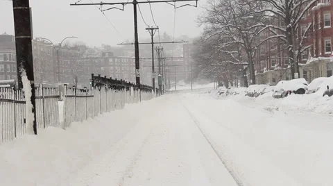 Train tracks covered in snow during winter storm Vídeo Stock 46722920