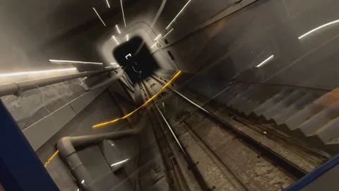 Train Tracks Inside Mountain Tunnel with Mysterious Lighting Stock Footage 311058468
