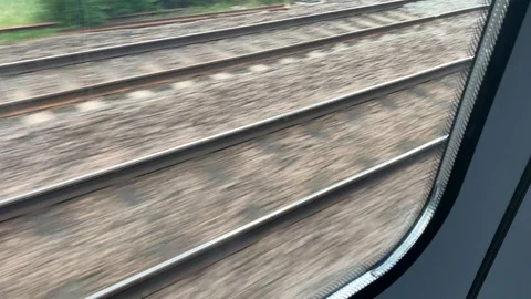 Train tracks moving passed on a train journey. Stock Footage 112080484