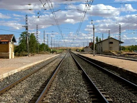 Train tracks next to the station Stock Photos