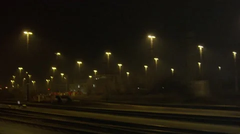 Train tracks at night drive by Stock-Footage 45355047