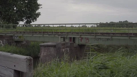 Train tracks over a river (4k) Video stock 78103229