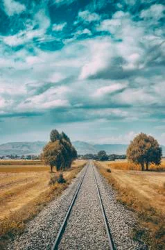 Train tracks photographed from inside the train Stock Photos