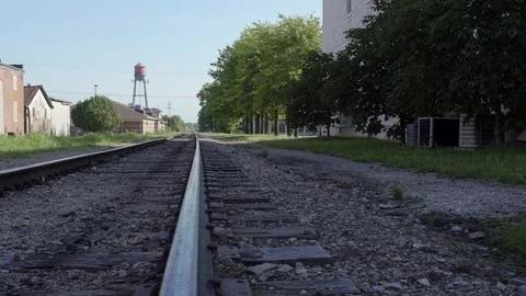 Train Tracks Run By A Water Tower In A Small Town Stock Footage 87480272