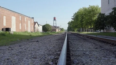 Train Tracks Run By A Water Tower In A Small Town Stock Footage 87480282