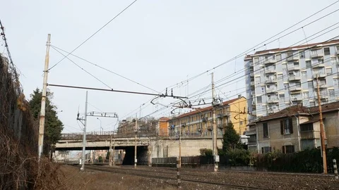 Train tracks in suburban area close to Milan Stock Footage 73447272