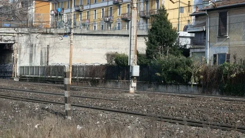 Train tracks in suburban area close to Milan Stock Footage 73447355