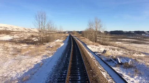 Train on Tracks Time Lapse Snowy Prarie Winter Landscape Stock Footage 71110264