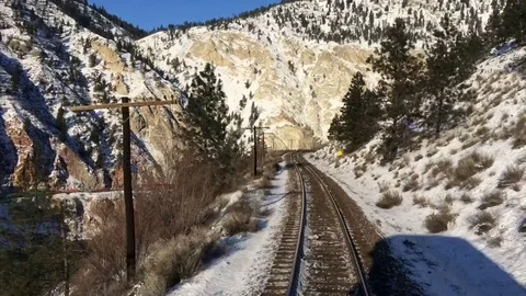 Train on Tracks Time Lapse Snowy Winter Mountain Landscape Stock Footage 71110386