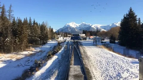 Train on Tracks Time Lapse Snowy Desert Winter Landscape Stock Footage 71110398