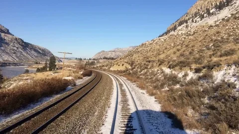 Train on Tracks Time Lapse Snowy Desert Winter Landscape Stock Footage 71110589