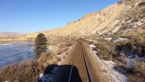 Train on Tracks Time Lapse Snowy Desert Winter Landscape Stock Footage 71110760