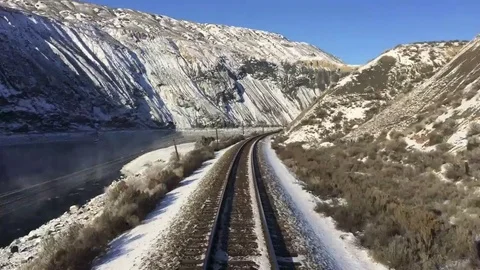 Train on Tracks Time Lapse Snowy Desert Winter Landscape Stock Footage 71132836