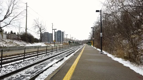 Train tracks at a train station, winter overcast day. Stock Footage 102805096
