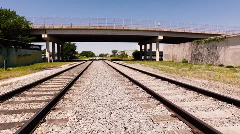 Train Tracks Under Trestle Then Into The Air 60 fps Stock Footage 65506265