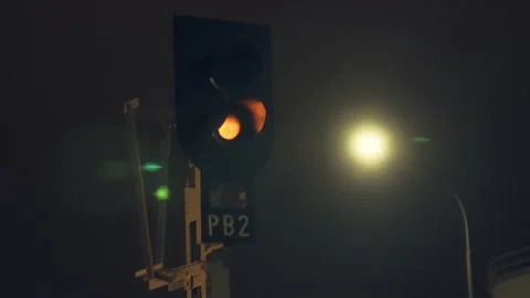 Train traffic light at night Stock Footage 143229751