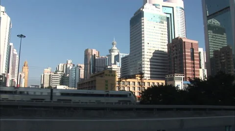 Train &amp; traffic on modern overpass, China Stock Footage 56624356