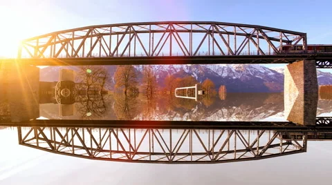 Train traffic transportation. crossing bride. mirror reflection. sunset dusk Video stock 64540608