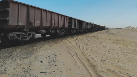 Train. Train in Mauritania. Train carrying coal. Industry in Mauritania. Film Stock Footage 137491864
