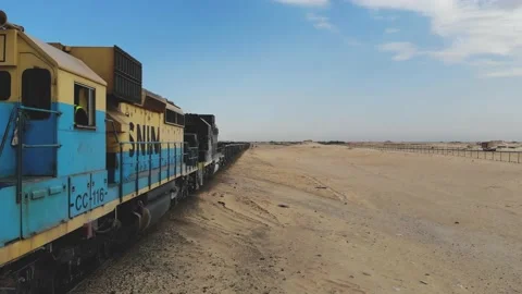 Train. Train in Mauritania. Train carrying coal. Industry in Mauritania. Film Stock Footage 137491891