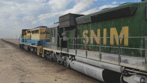 Train. Train in Mauritania. Train carrying coal. Industry in Mauritania. Film Stock Footage 137491948