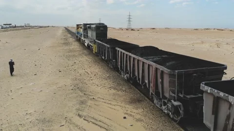 Train. Train in Mauritania. Train carrying coal. Industry in Mauritania. Film Stock Footage 137491983
