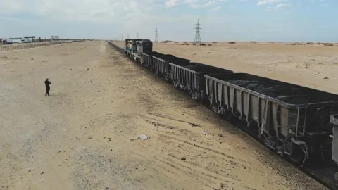 Train. Train in Mauritania. Train carrying coal. Industry in Mauritania. Film Stock Footage 137491999
