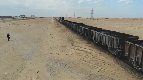 Train. Train in Mauritania. Train carrying coal. Industry in Mauritania. Film Stock Footage 137492019