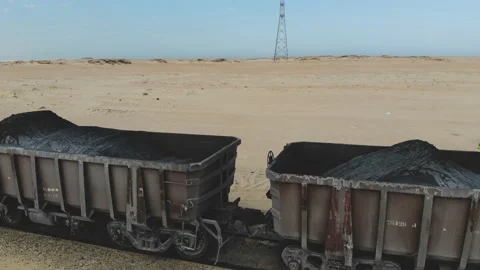 Train. Train in Mauritania. Train carrying coal. Industry in Mauritania. Film Stock Footage 137492070