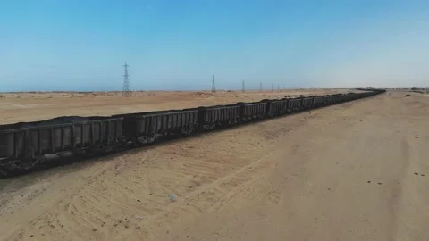 Train. Train in Mauritania. Train carrying coal. Industry in Mauritania. Film Stock Footage 137492109