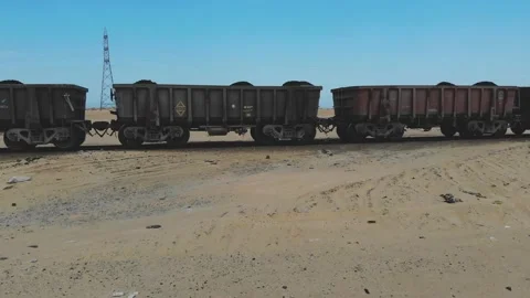 Train. Train in Mauritania. Train carrying coal. Industry in Mauritania. Film Stock Footage 137492126