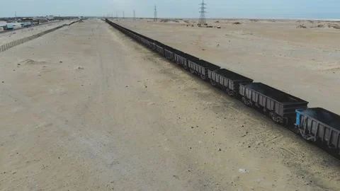 Train. Train in Mauritania. Train carrying coal. Industry in Mauritania. Film Stock Footage 137492169