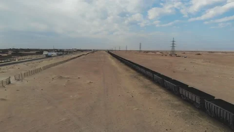 Train. Train in Mauritania. Train carrying coal. Industry in Mauritania. Film Stock Footage 137492185