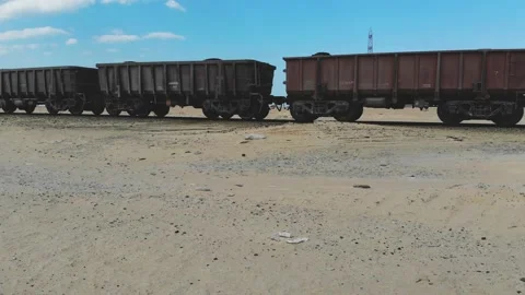 Train. Train in Mauritania. Train carrying coal. Industry in Mauritania. Film Stock Footage 137492207