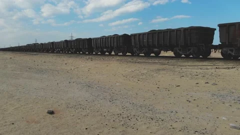 Train. Train in Mauritania. Train carrying coal. Industry in Mauritania. Film Stock Footage 137492249