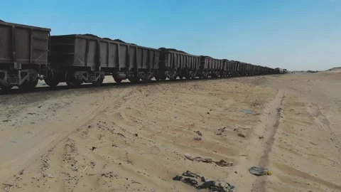 Train. Train in Mauritania. Train carrying coal. Industry in Mauritania. Film Stock Footage 137492293