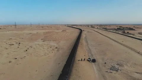 Train. Train in Mauritania. Train carrying coal. Industry in Mauritania. Film Stock Footage 137493069