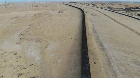 Train. Train in Mauritania. Train carrying coal. Industry in Mauritania. Film Stock Footage 137493084